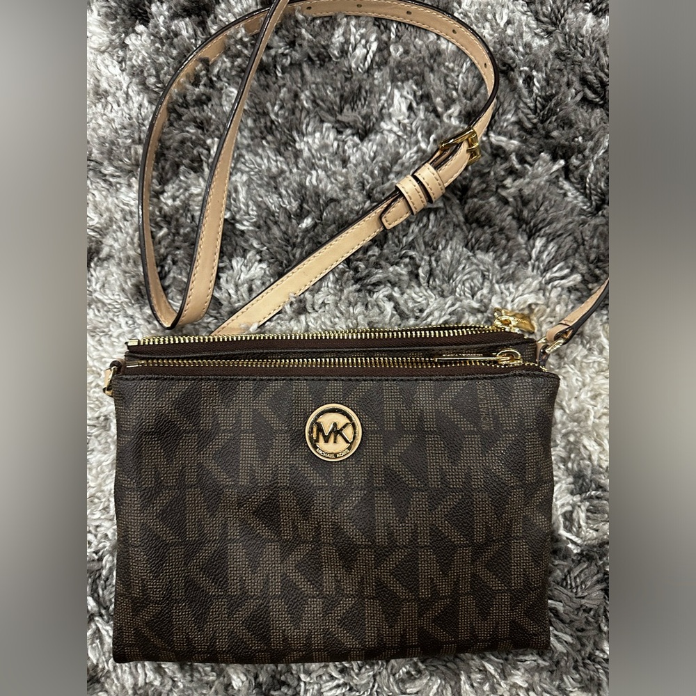 Micheal Kors slightly used multiple compartment brown and tan shoulder bag